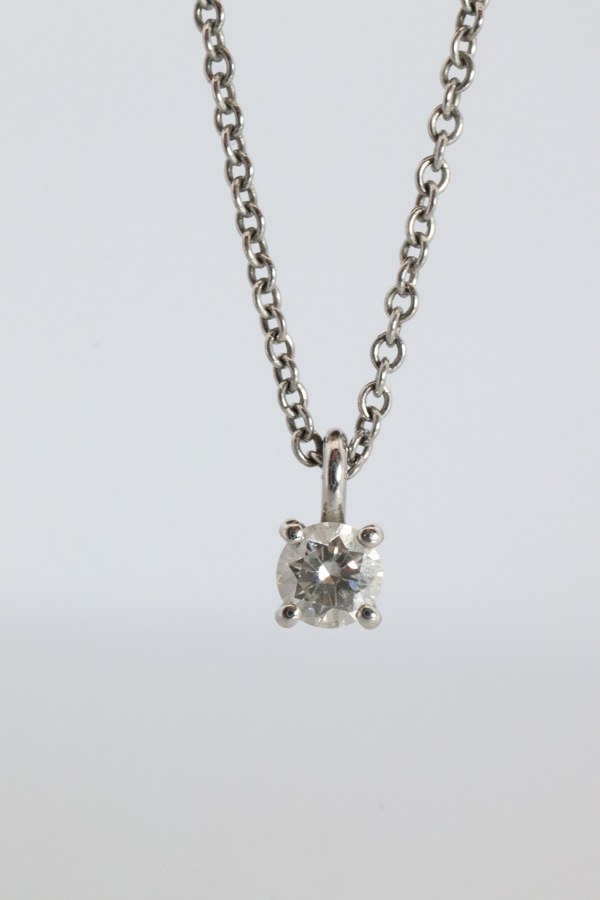 Tiffany Co Diamond Solitaire Necklace. Platinum 0.15ct Diamond Pendant.