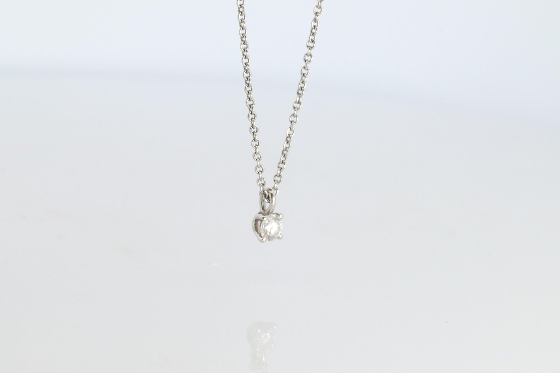 Tiffany Co Diamond Solitaire Necklace. Platinum 0.15ct Diamond Pendant.
