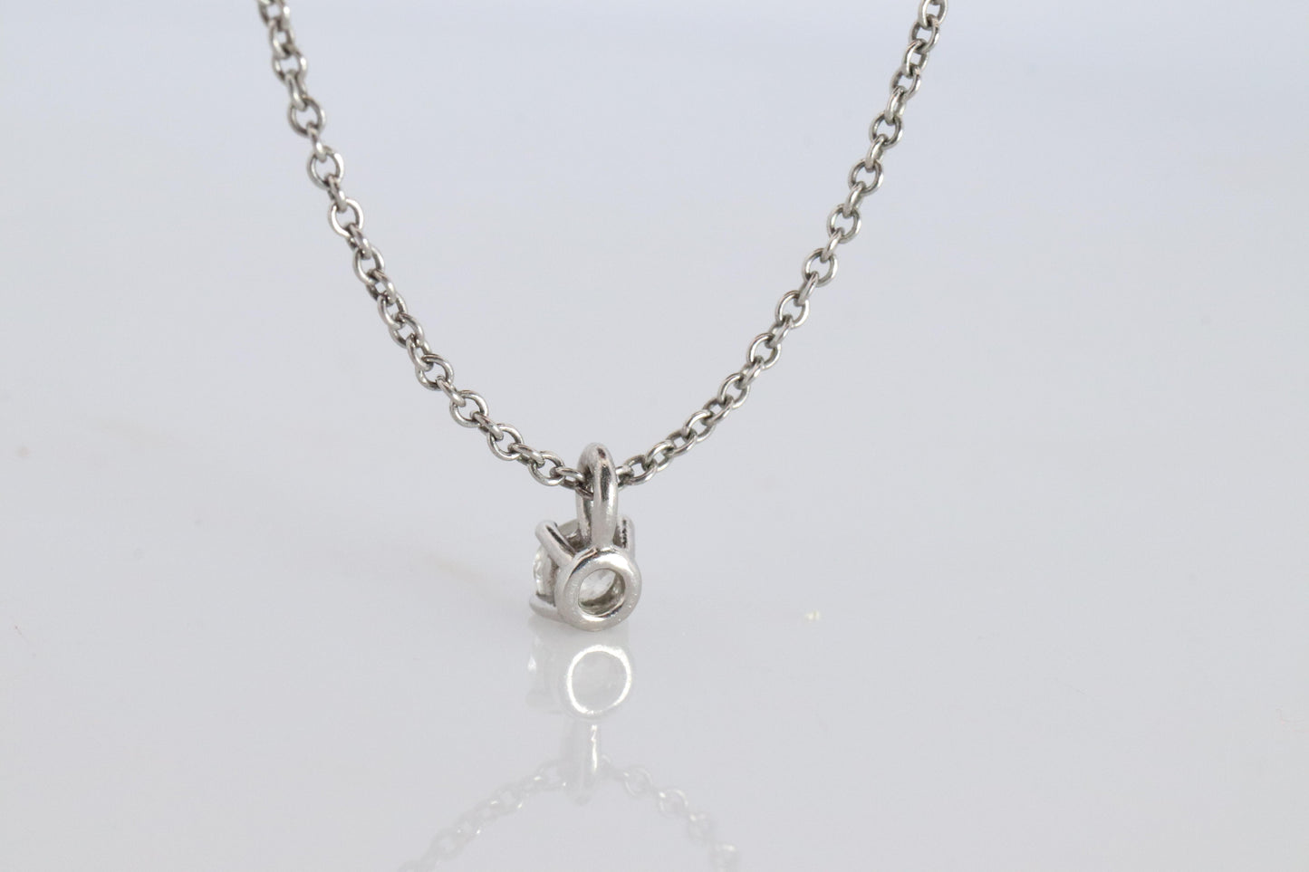Tiffany Co Diamond Solitaire Necklace. Platinum 0.15ct Diamond Pendant.