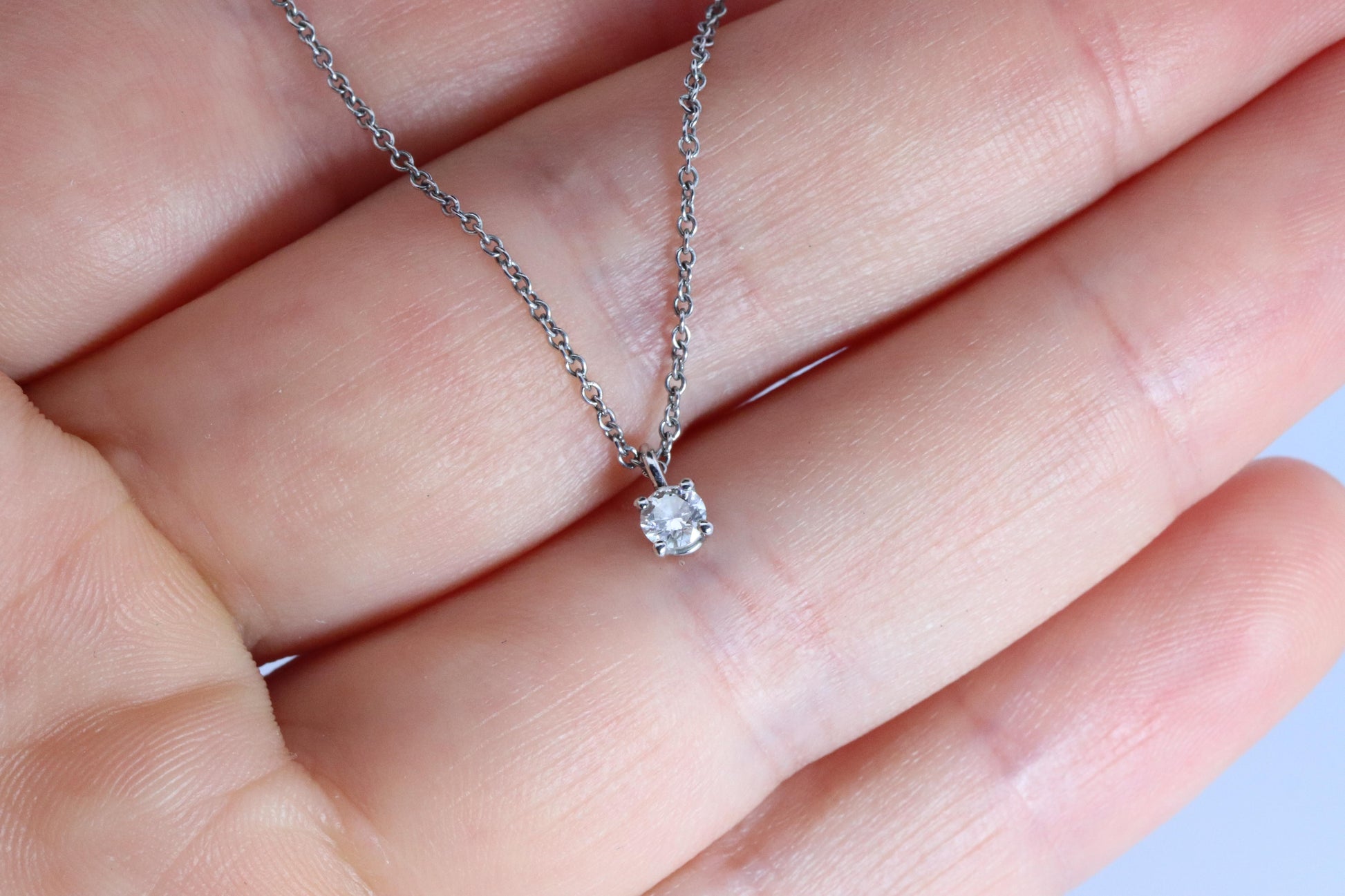 Tiffany Co Diamond Solitaire Necklace. Platinum 0.15ct Diamond Pendant.