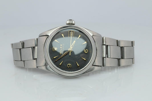 ROLEX Watch. Rolex ref. 6646 Rare Black Waffle Dial 1950s Mens Rolex watch.