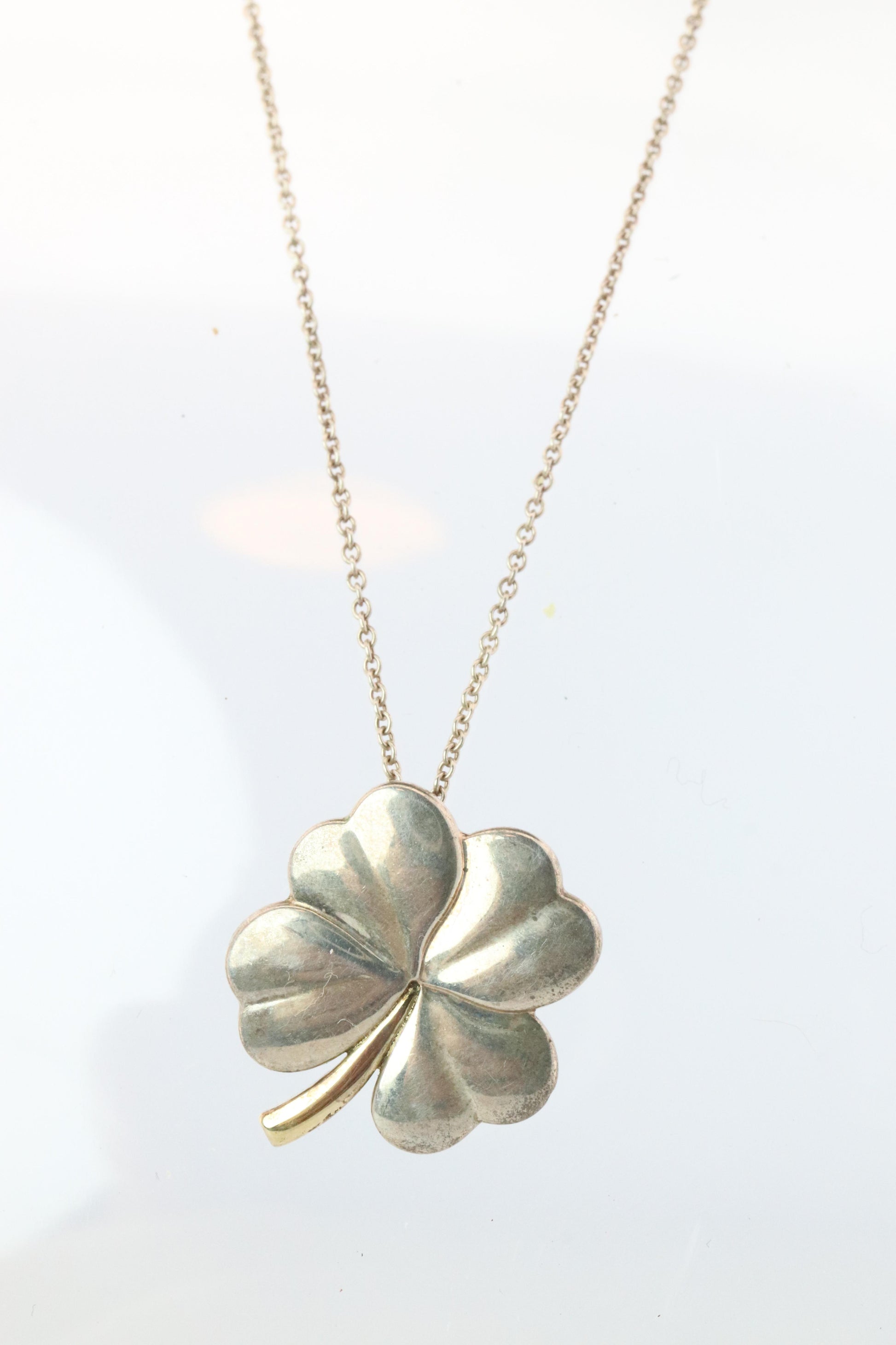 Tiffany and Co Four Leaf Clover Pendant. 18k and Sterling Silver