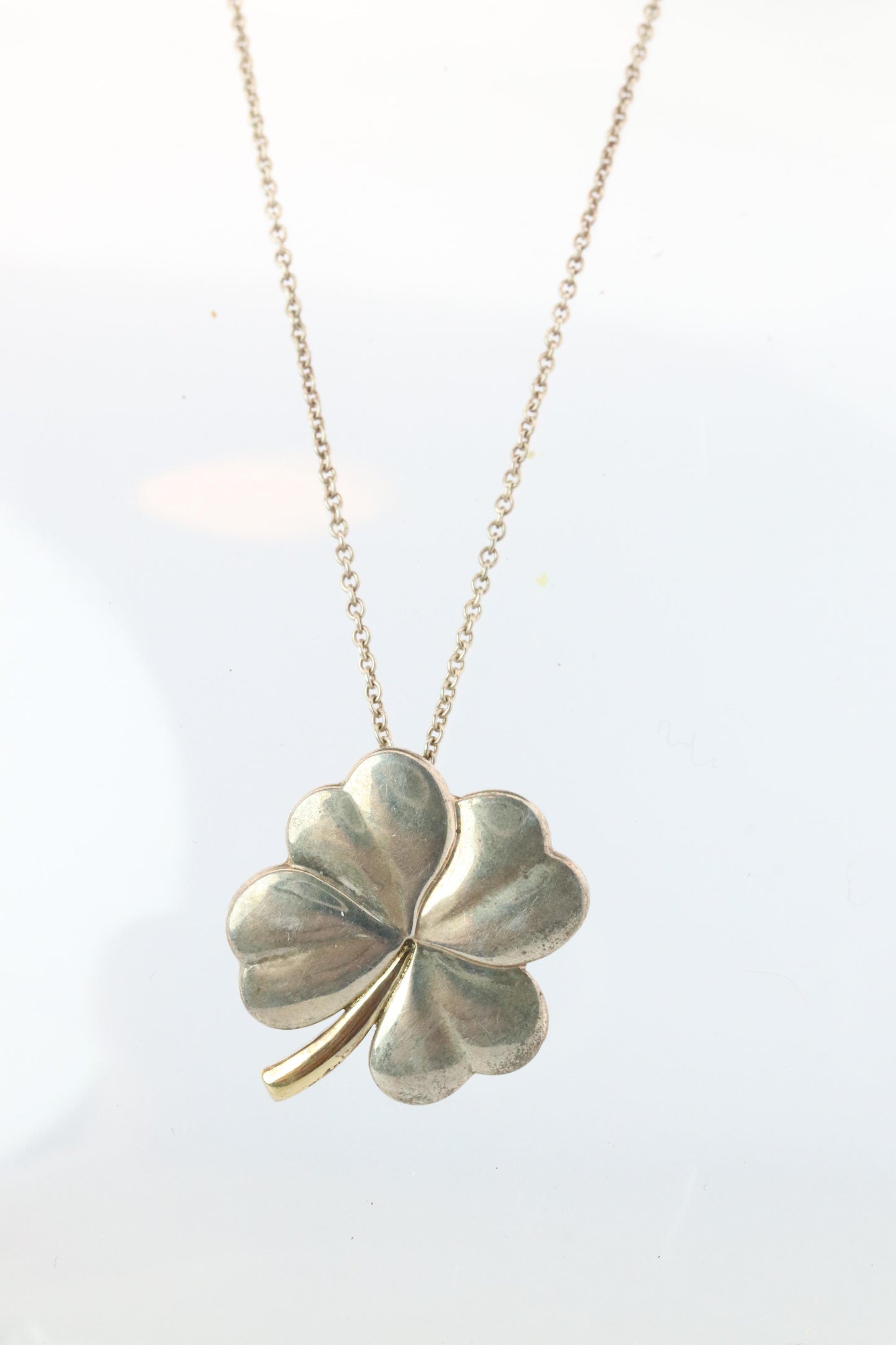 Tiffany and Co Four Leaf Clover Pendant. 18k and Sterling Silver