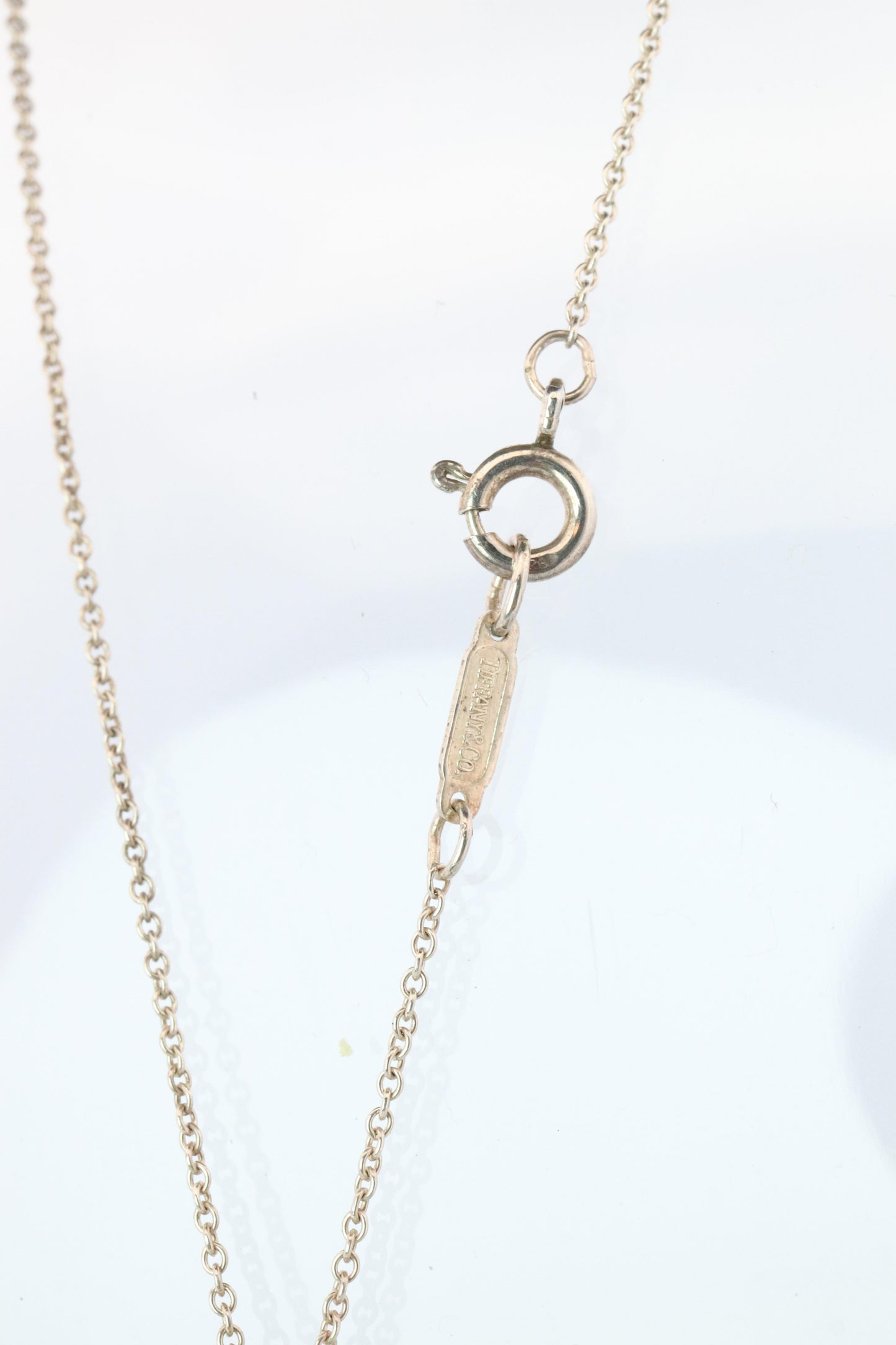 Tiffany and Co Four Leaf Clover Pendant. 18k and Sterling Silver