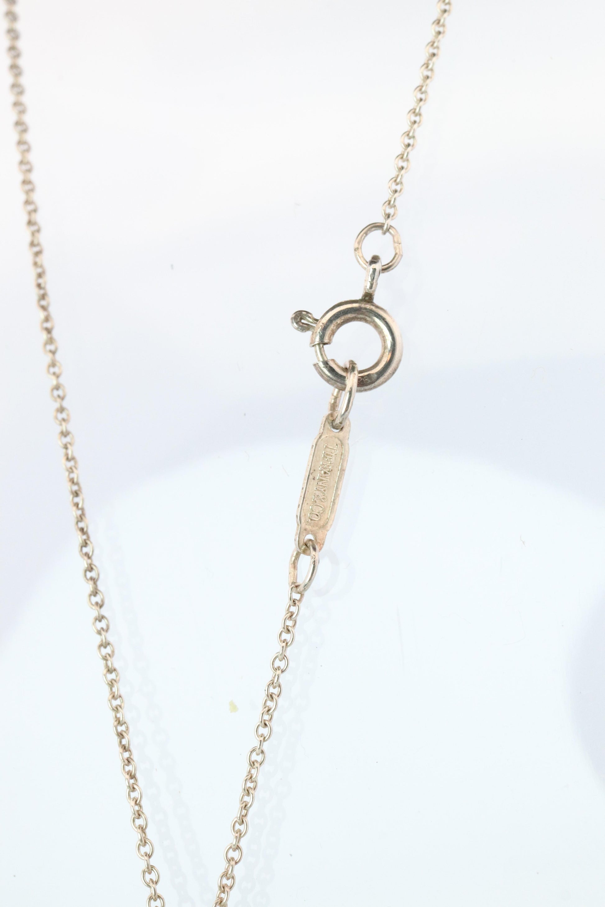 Tiffany and Co Four Leaf Clover Pendant. 18k and Sterling Silver