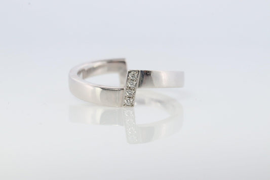 Mikimoto Ring. Vintage 750 Mikimoto Diamond Shifted bypass wedding band.