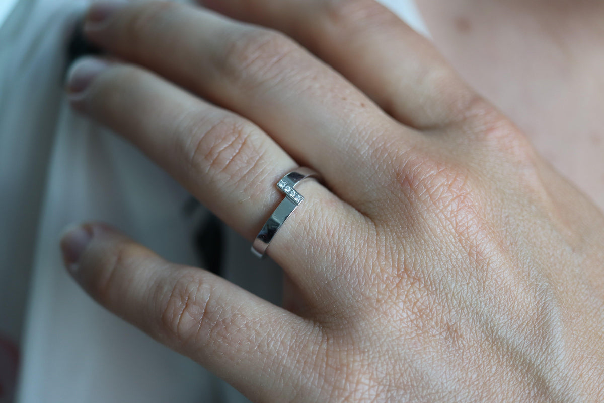 Mikimoto Ring. Vintage 750 Mikimoto Diamond Shifted bypass wedding band.