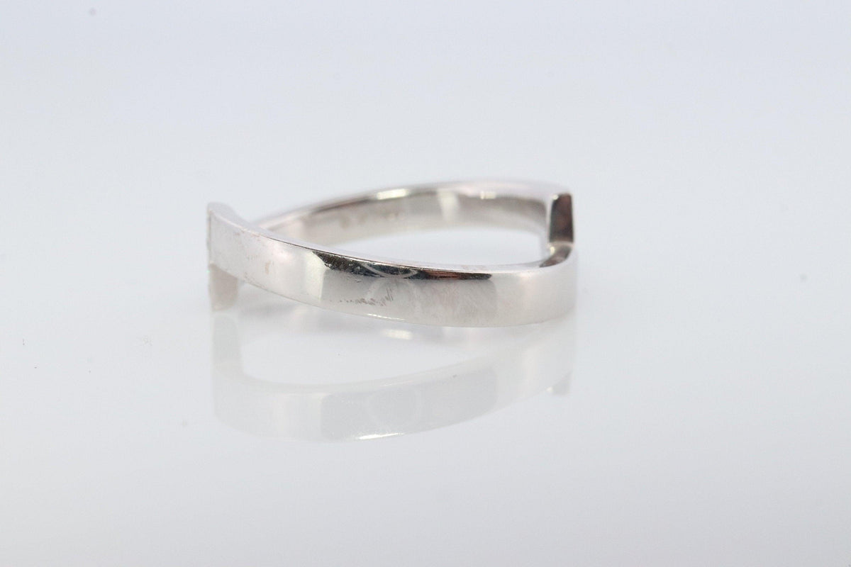 Mikimoto Ring. Vintage 750 Mikimoto Diamond Shifted bypass wedding band.
