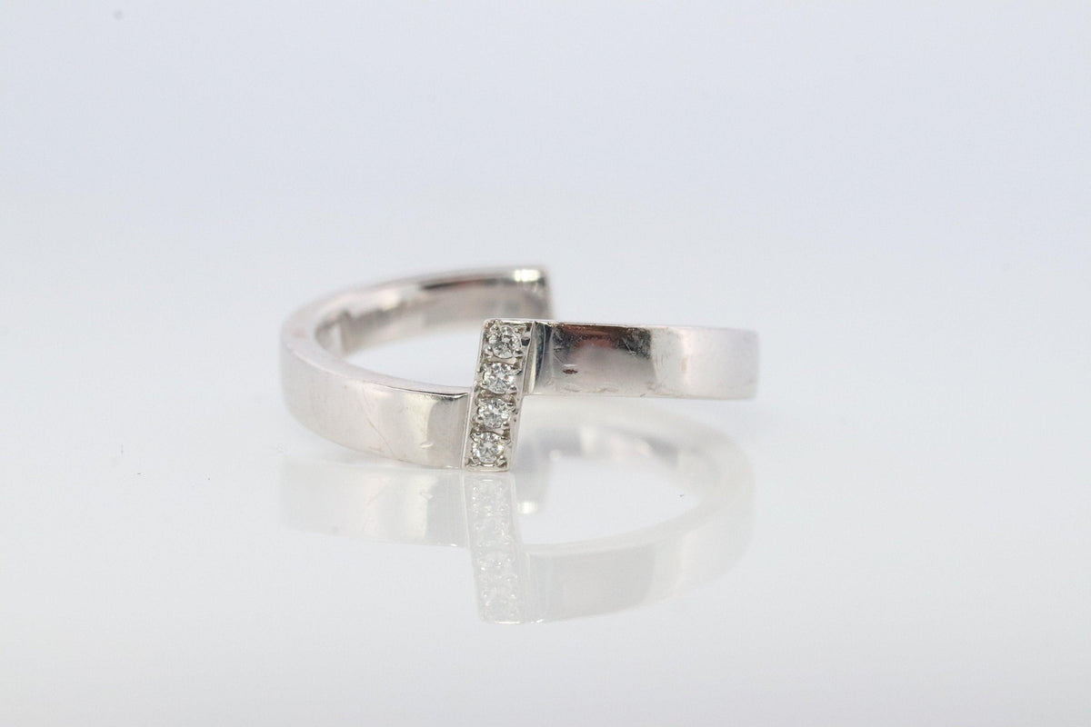 Mikimoto Ring. Vintage 750 Mikimoto Diamond Shifted bypass wedding band.