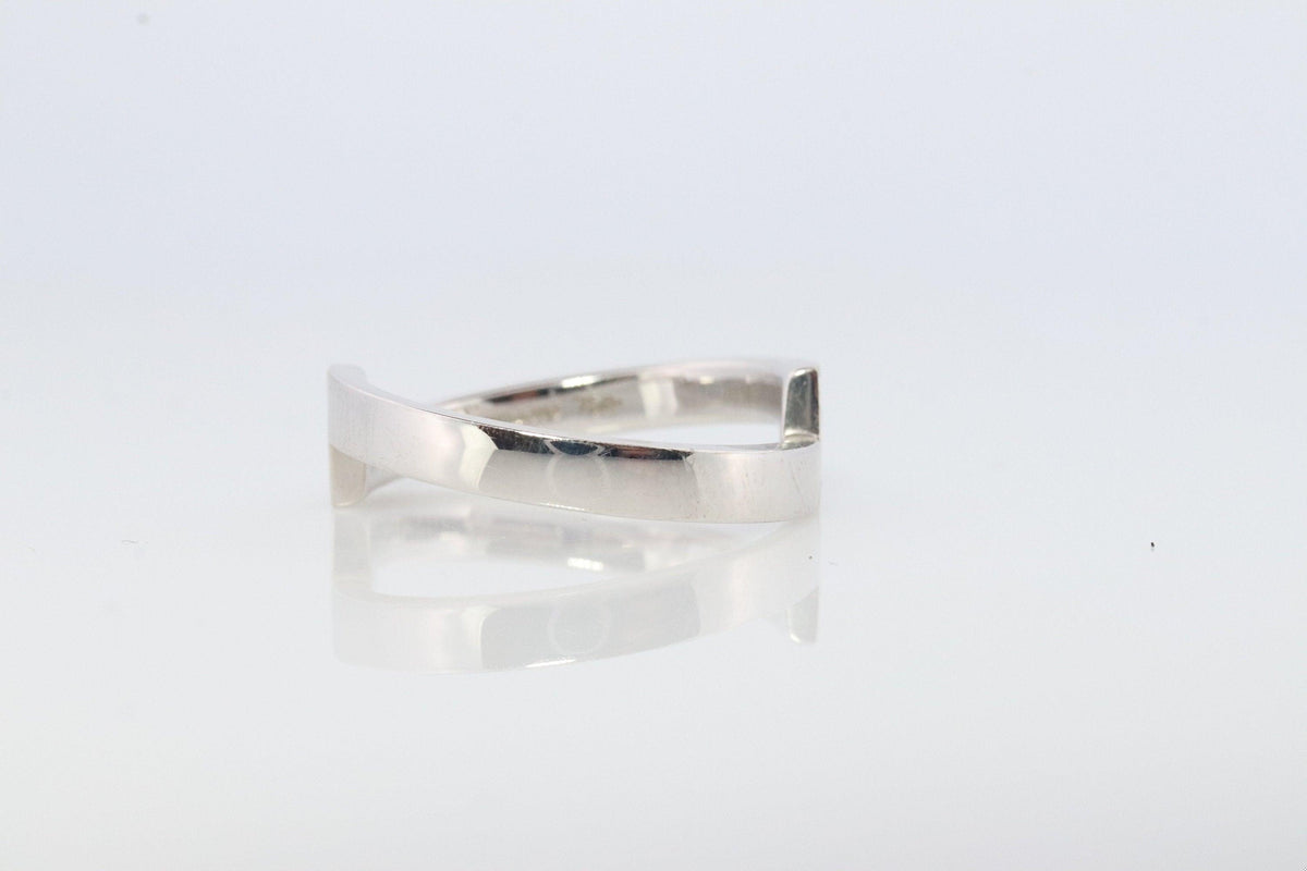 Mikimoto Ring. Vintage 750 Mikimoto Diamond Shifted bypass wedding band.