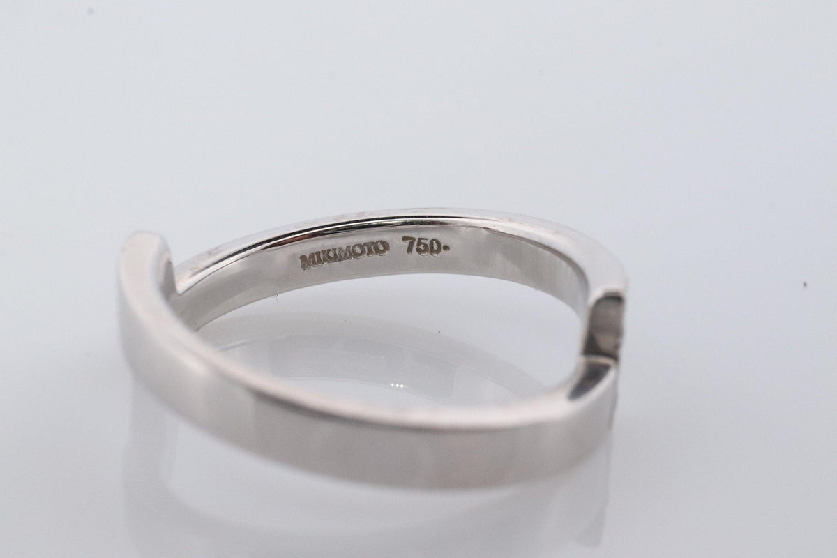 Mikimoto Ring. Vintage 750 Mikimoto Diamond Shifted bypass wedding band.