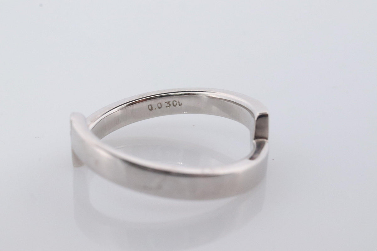 Mikimoto Ring. Vintage 750 Mikimoto Diamond Shifted bypass wedding band.