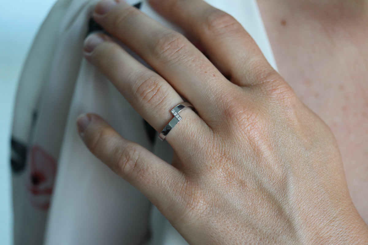 Mikimoto Ring. Vintage 750 Mikimoto Diamond Shifted bypass wedding band.