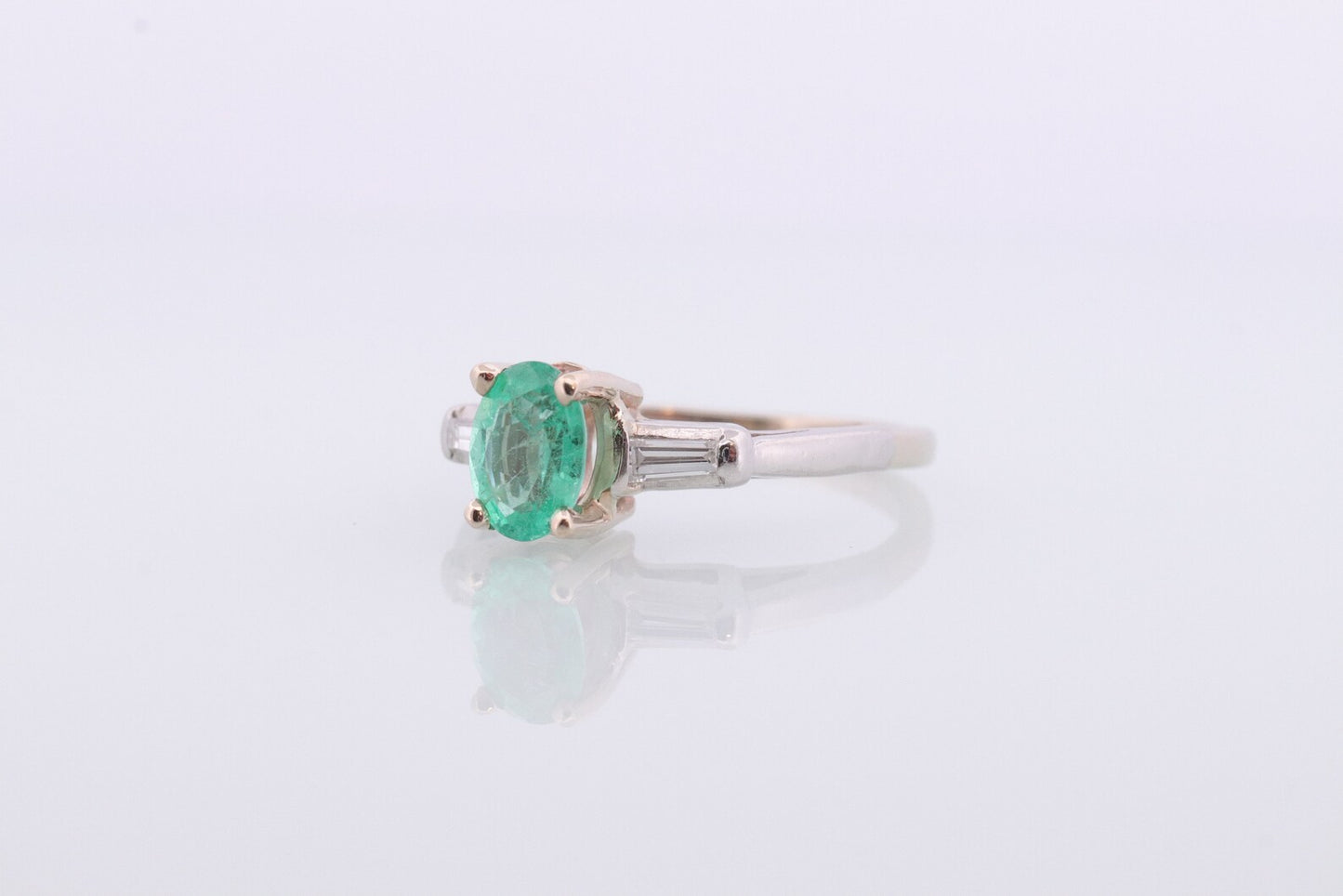 14k Oval Emerald and Baguette diamond ring. 14k white gold Green Emerald solitaire.