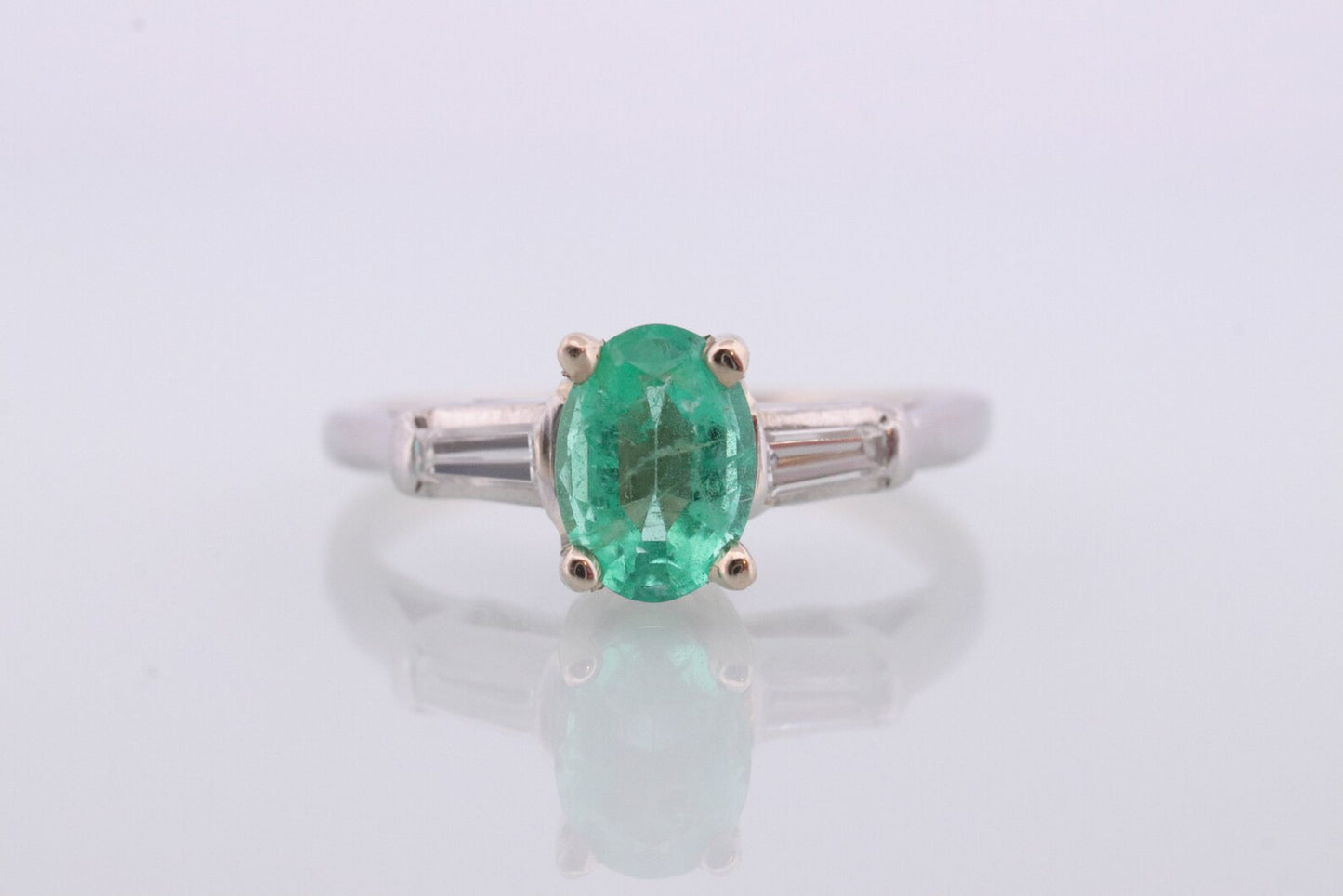 14k Oval Emerald and Baguette diamond ring. 14k white gold Green Emerald solitaire.