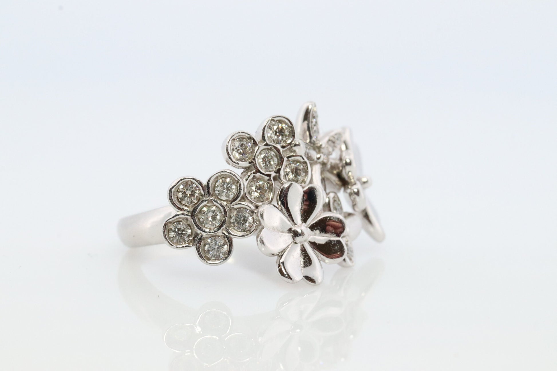 Platinum Flower Cluster ring. Diamond bezel set Daisy Flower bouquet band. Heavy Platinum Intricate Embossed design