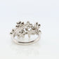 Platinum Flower Cluster ring. Diamond bezel set Daisy Flower bouquet band. Heavy Platinum Intricate Embossed design