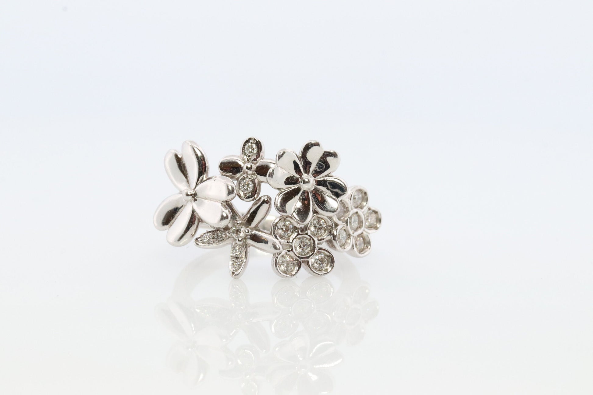 Platinum Flower Cluster ring. Diamond bezel set Daisy Flower bouquet band. Heavy Platinum Intricate Embossed design