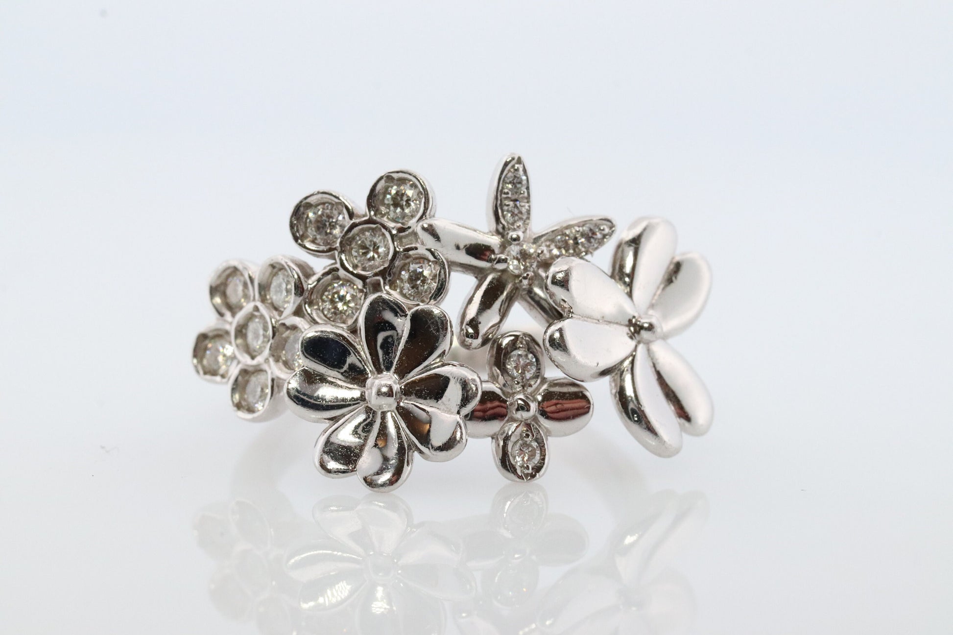 Platinum Flower Cluster ring. Diamond bezel set Daisy Flower bouquet band. Heavy Platinum Intricate Embossed design