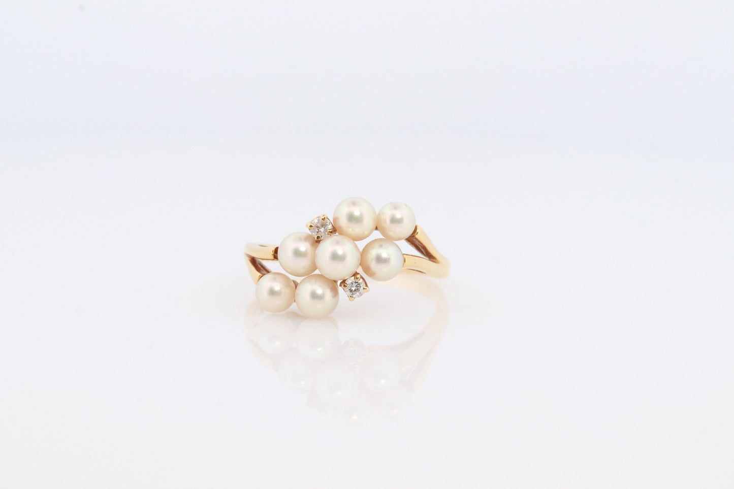 18k MIKIMOTO Cluster pearl ring. Mikimoto 750 saltwater pearl and diamond cluster bypass ring. Grape vine pearls.
