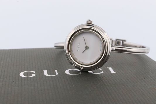 Genuine GUCCI 11/12.2 Watch. Vintage Ladies Gucci Silver Change Bangle Bezel Watch. Box and papers