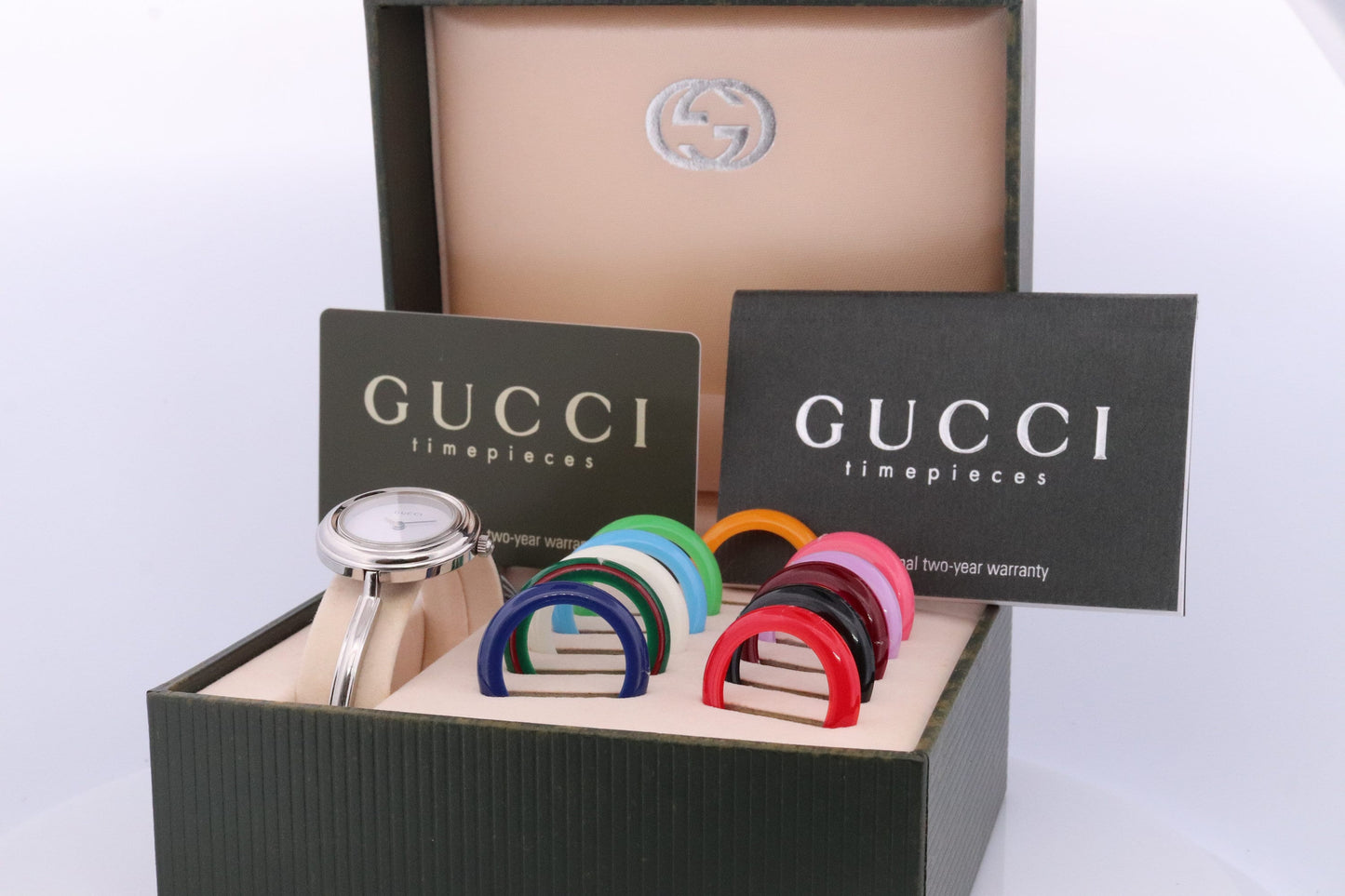 Genuine GUCCI 11/12.2 Watch. Vintage Ladies Gucci Silver Change Bangle Bezel Watch. Box and papers