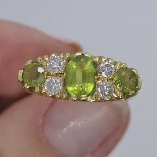 18k Large Peridot and Diamond Ring. Made in UK 1976. 6.4grams with 0.40ctw in diamonds