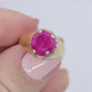 18k Round Pink Sapphire Solitaire ring. UnoAerre 18k yellow gold Sapphire ring.