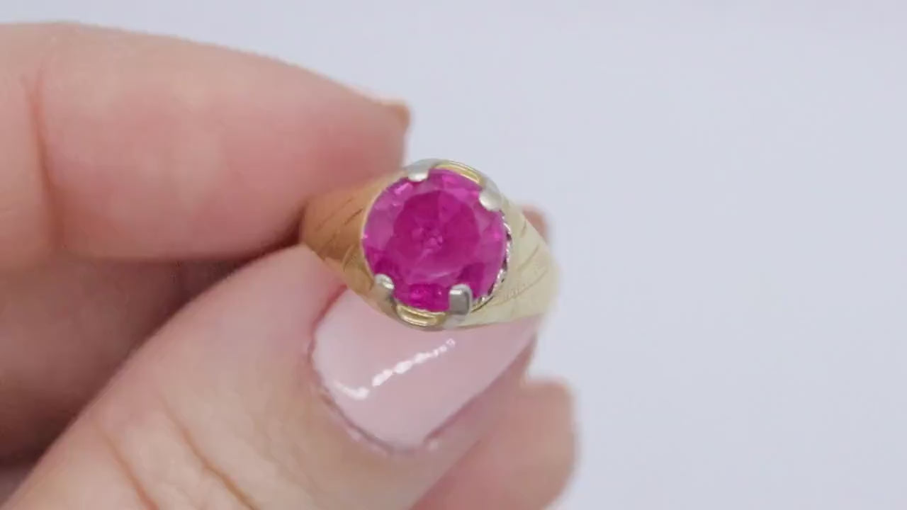 18k Round Pink Sapphire Solitaire ring. UnoAerre 18k yellow gold Sapphire ring.