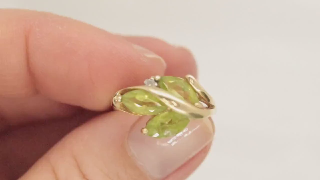 10k Peridot Marquise Leaf Motif Cluster ring. Peridot diamond ring.