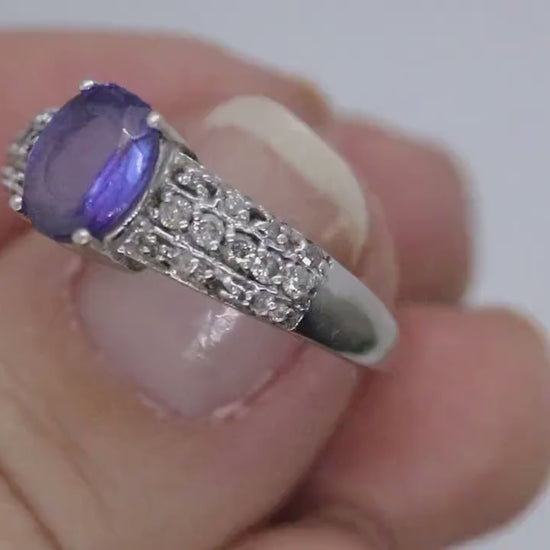 Tanzanite and diamond ring. 14k Blue Tanzanite solitaire.