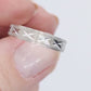 18K White Gold X Textured Cross Band 4mm. Sz 7.75. Stackable ring.