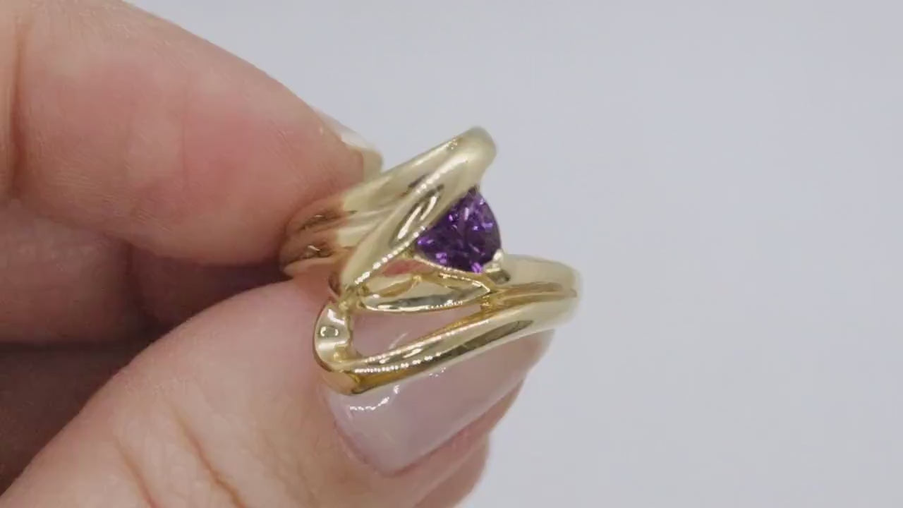 Trilliant Amethyst 10k Gold ring. 10k Triangular Amethyst in a Bypass Ring.