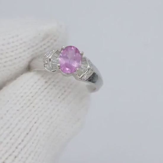 Oval Pink Sapphire Solitaire. 14k white gold with diamond melees st195