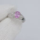 Oval Pink Sapphire Solitaire. 14k white gold with diamond melees st195