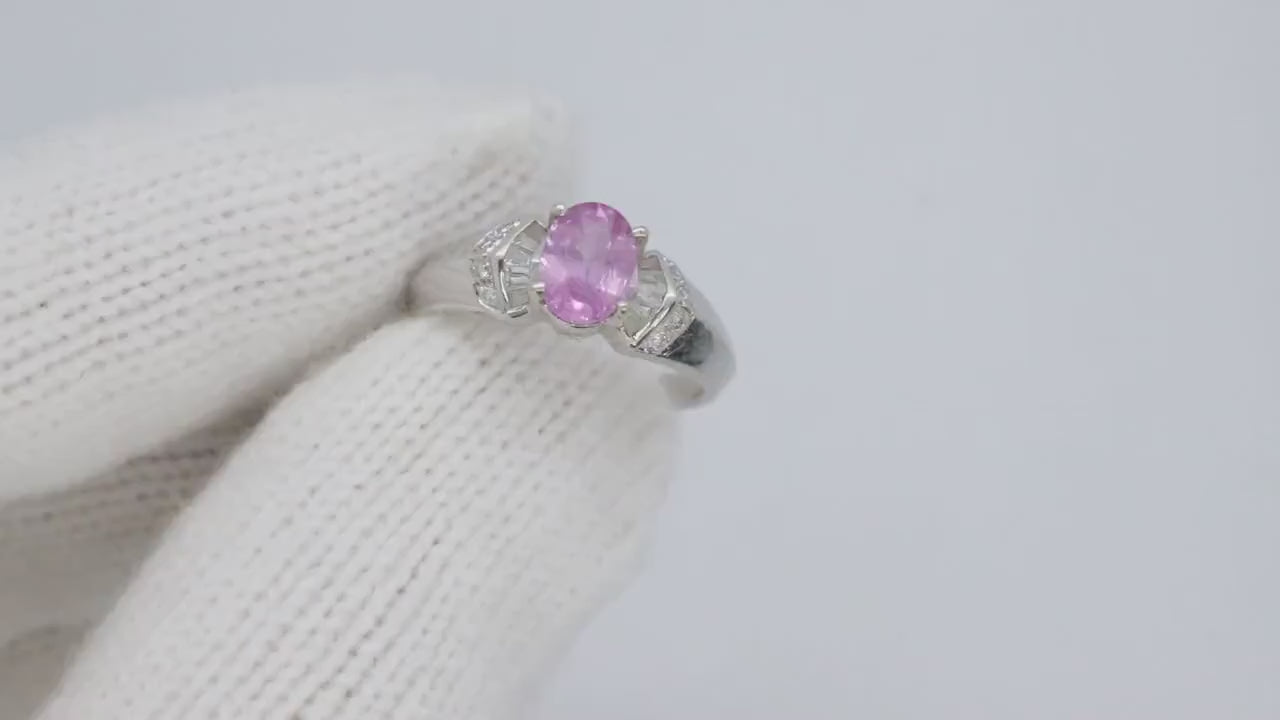 Oval Pink Sapphire Solitaire. 14k white gold with diamond melees st195