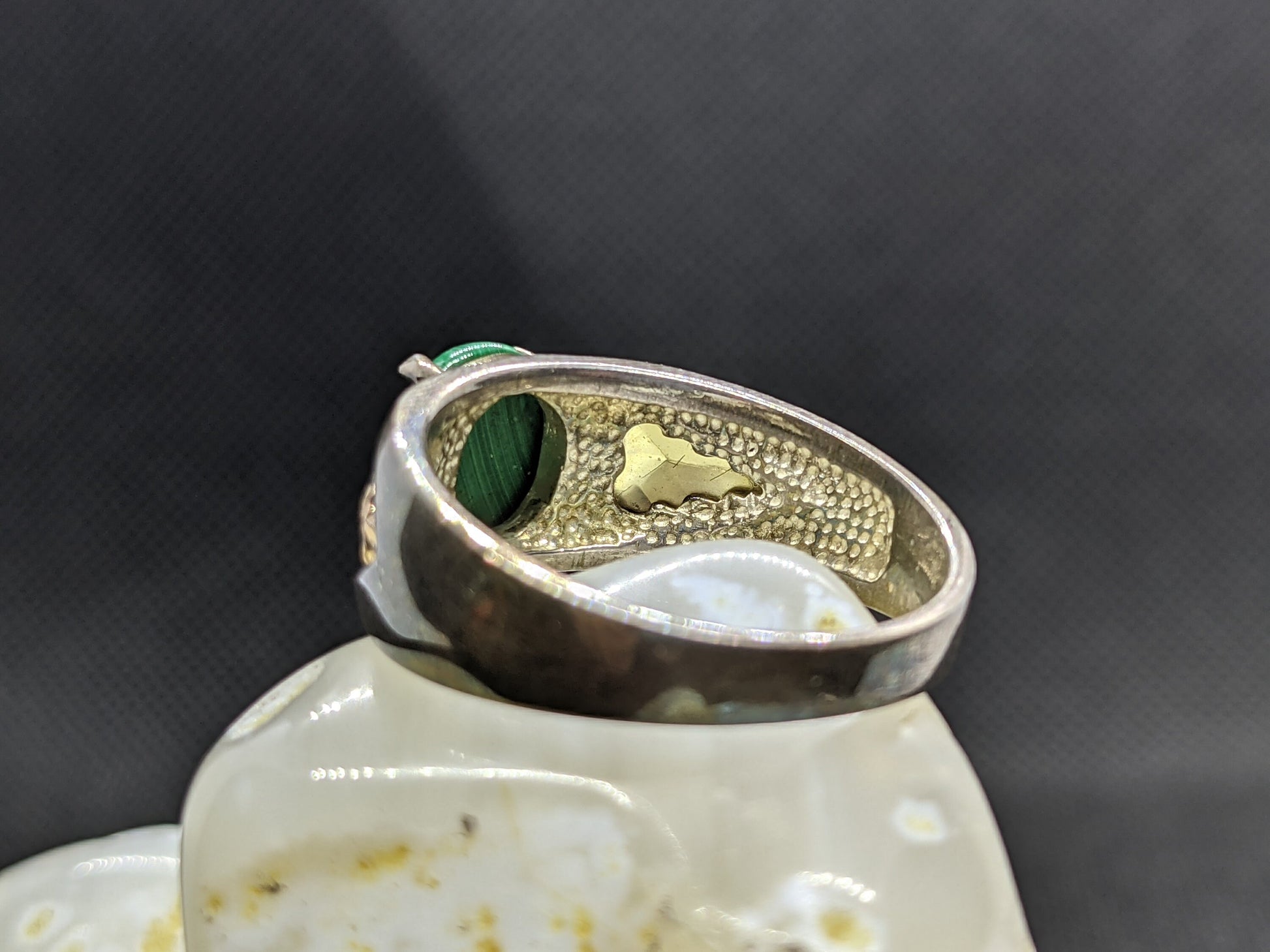 Black Hills Gold Sterling Silver Ring. Green Malachite cabochon with 10k gold inlays band.