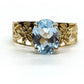 Oval Aquamarine Topaz Solitaire. 10k Filigree ring.