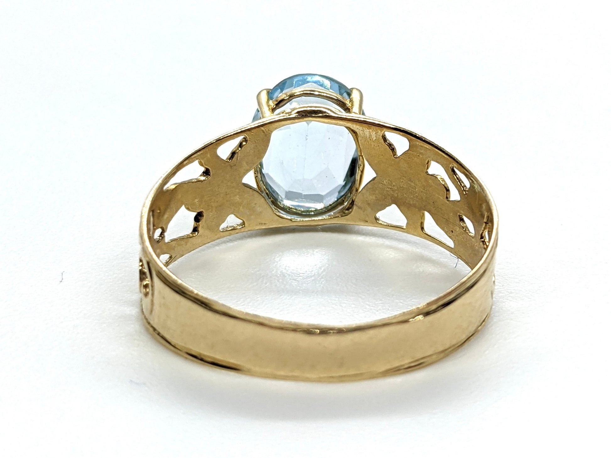 Oval Aquamarine Topaz Solitaire. 10k Filigree ring.