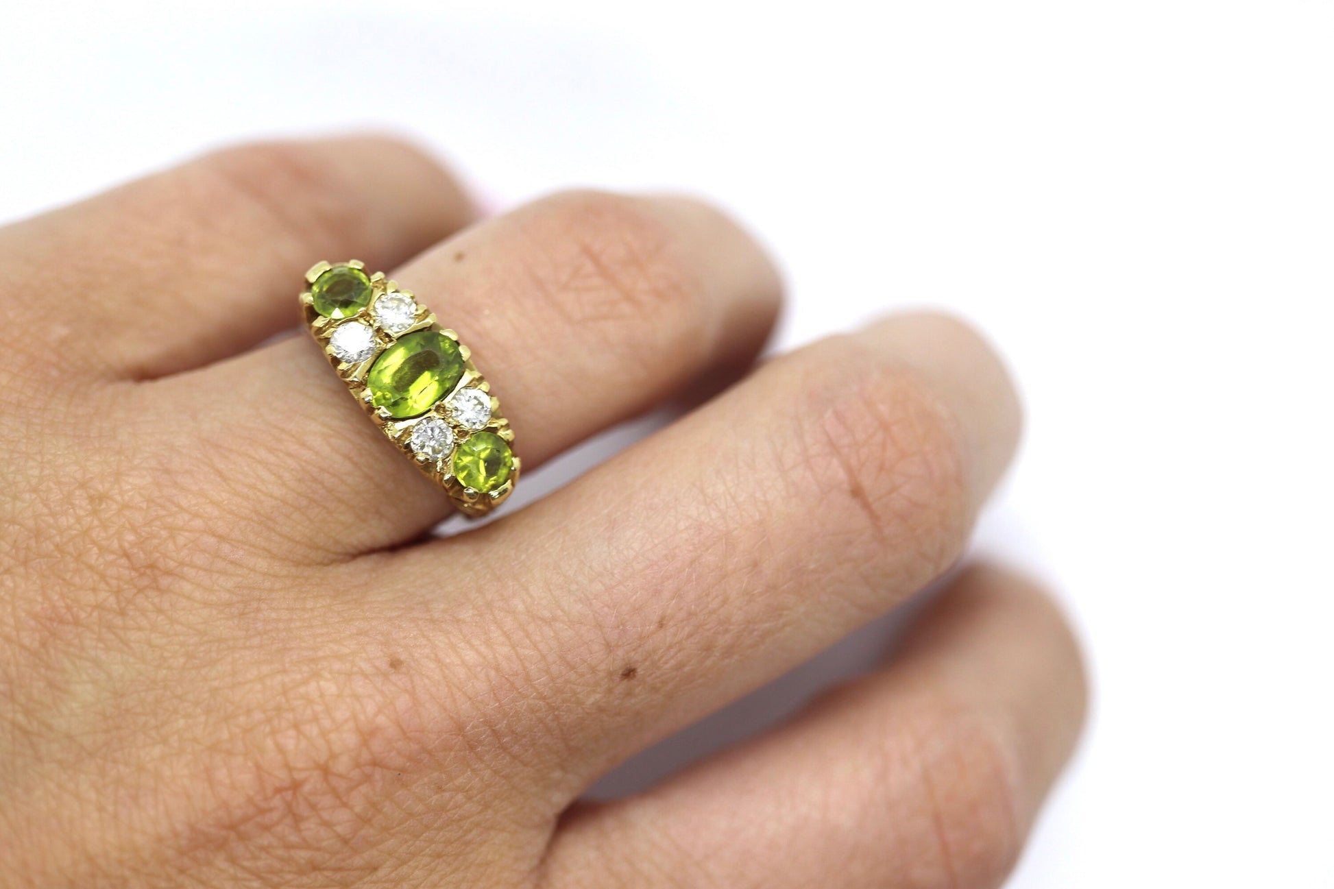 18k Large Peridot and Diamond Ring. Made in UK 1976. 6.4grams with 0.40ctw in diamonds