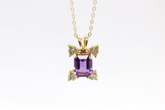 14k Amethyst emerald cut with Diamonds pendant. Diamond cluster star and 16in rolo necklace