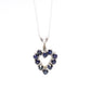 14k Open Heart Pendant. London Blue Topaz set into White Gold open heart Necklace.