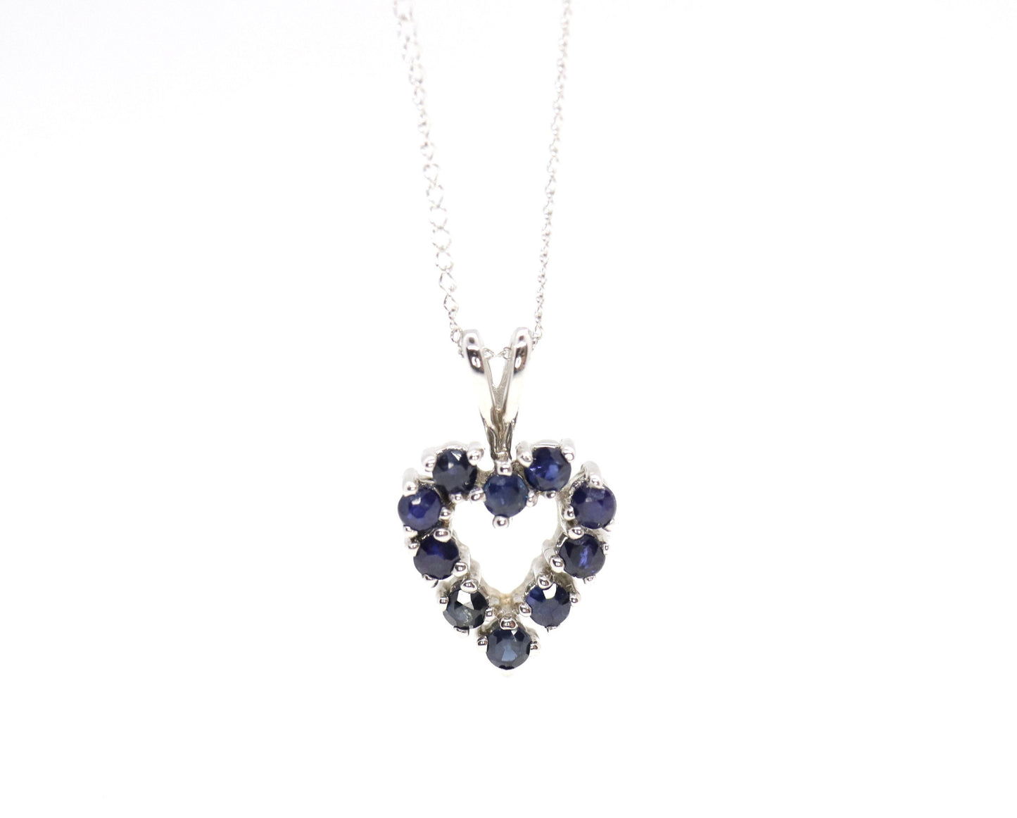 14k Open Heart Pendant. London Blue Topaz set into White Gold open heart Necklace.