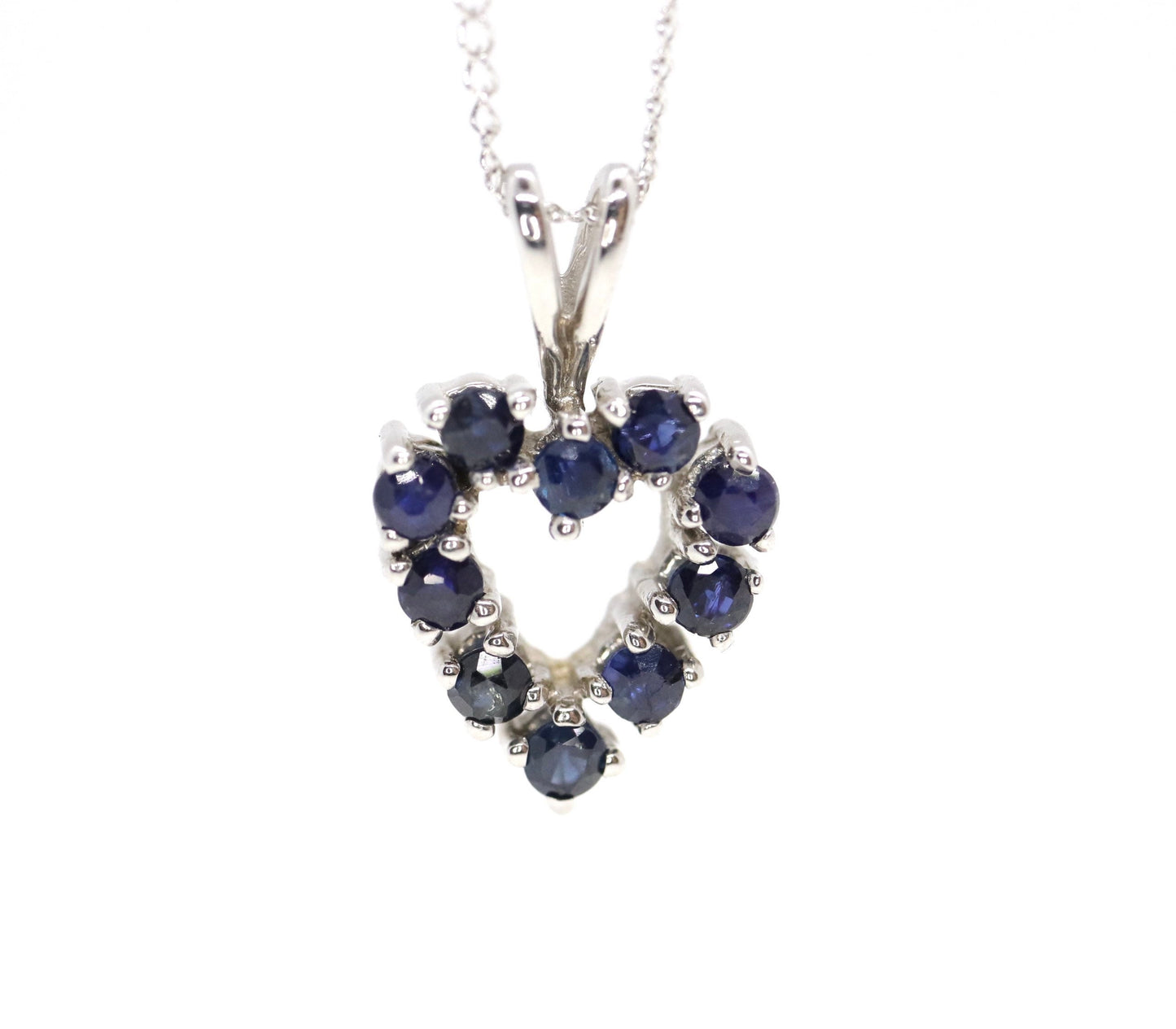 14k Open Heart Pendant. London Blue Topaz set into White Gold open heart Necklace.