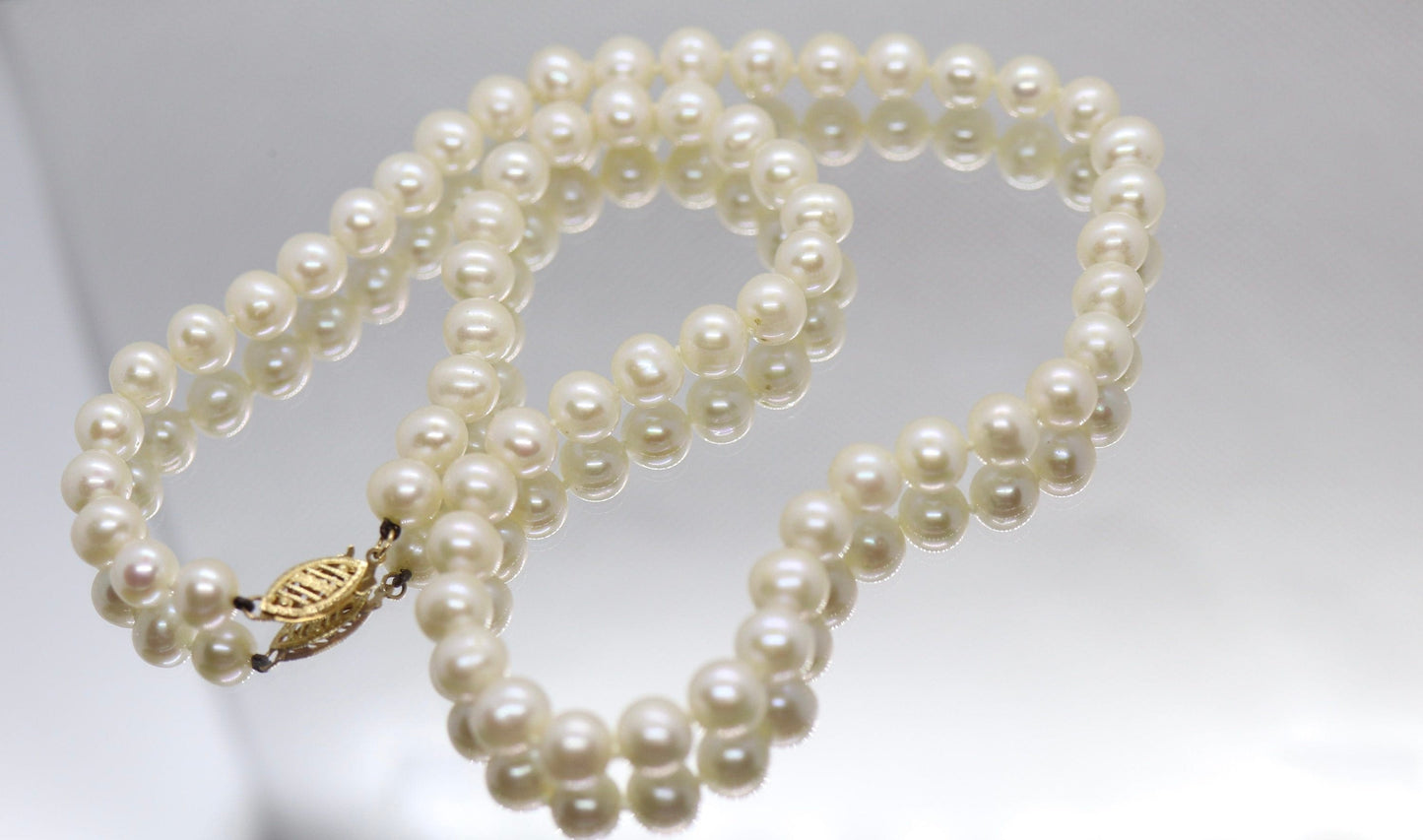 14k Gold FIC Cultured freshwater Pearls. 18in length