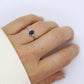 Platinum Sapphire and diamond ring. Oval blue Sapphire solitaire with Diamond accents trilogy ring.