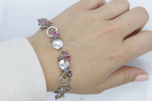 Laura Gibson Bracelet. Sterling Silver with Dangling Faceted Gems -Pink Tourmaline, Smokey Quartz, and Whiskey Quartz (289)
