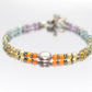 Laura Gibson Bracelet. Sterling Silver with Dangling Faceted Gems - (298)