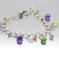 Laura Gibson Bracelet. Sterling Silver with Dangling Faceted Gems - Amethyst (464)
