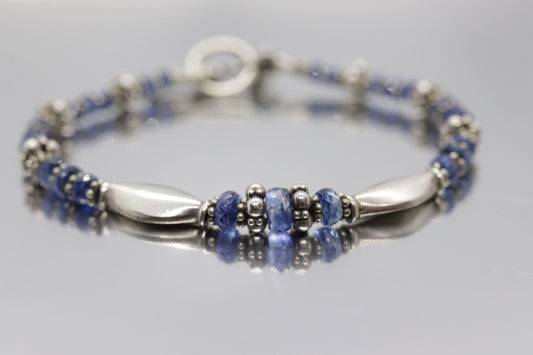 Laura Gibson Bracelet. Sterling Silver and with Dangling Faceted Gems - Topaz -  (595)